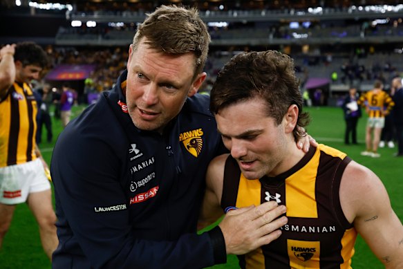 Sam Mitchell embraces Nick Watson after a finals win for the ages.