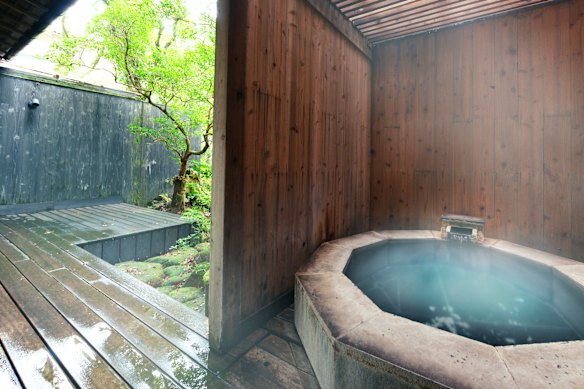 The premium Akashi room features a private hexagonal onsen.