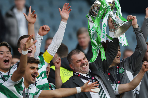Former Celtic manager Ange Postecoglou lifts the Viaplay Cup after beating Rangers on February 26, 2023.