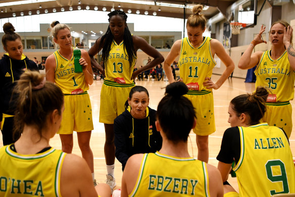 Opals coach Sandy Brondello (centre) has juggled family life and elite sport.