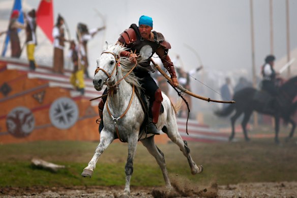 Horses play a big role at the World Nomad Games. In one bride chasing game, a woman can beat a man if she catches him. If he catches her, he can kiss her.
