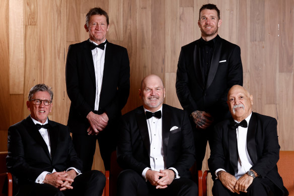 AFL Hall of Fame inductees Chris McDermott (top left), Dane Swan (top right), Kelvin Templeton (front left), Legend Jason Dunstall (centre) and Michael Graham (front right).