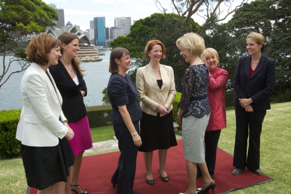 A different world: Governor-General Quentin Bryce speaks to female ministers in Julia Gillard’s government, including Kate Ellis (second from left), after their swearing-in at Admiralty House in 2011.