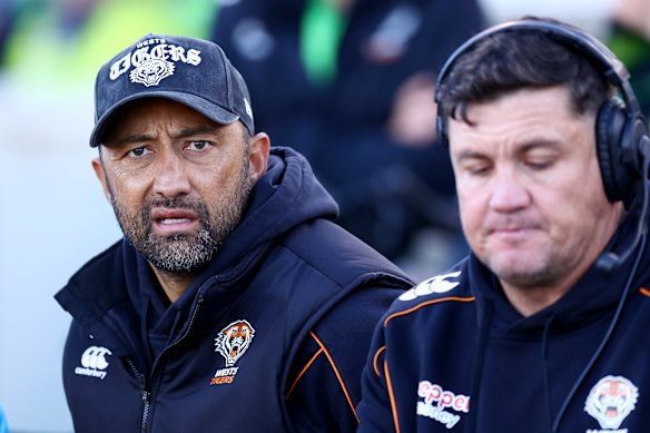 Tigers coach Benji Marshall looks on.