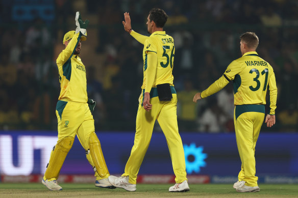 Mitchell Starc celebrates the wicket of Max O’Dowd