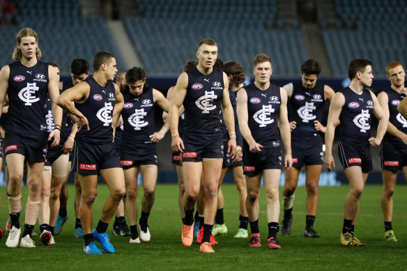 The Blues look dejected after their loss against North Melbourne on Saturday.