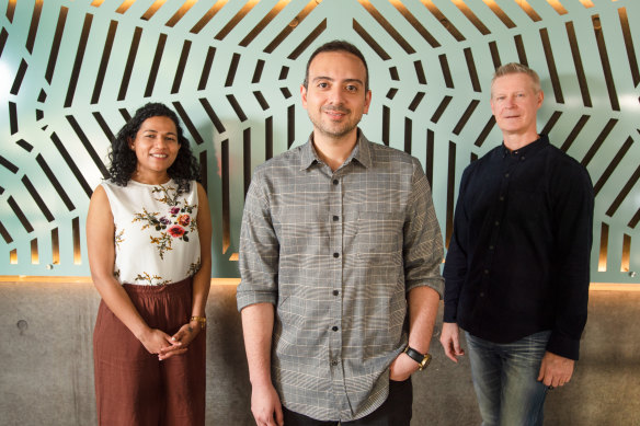 QUT researchers Hamzeh Tanha (centre), and Anita Sathyanarayanan (left), and Professor Dale Nyholt (right)