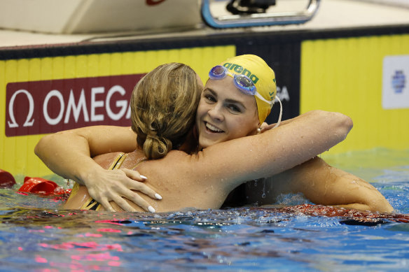Sweden’s Sarah Sjoestroem and Australia’s Shayna Jack hug after the women’s 50m freestyle final. 