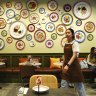 R.Harn’s walls feature dozens of plates that are used for Lunar New Year celebrations by families in Thailand.