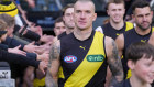 Dustin Martin played his final AFL match against the Kangaroos on July 30.