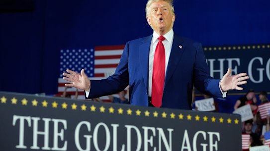 President Donald Trump at a rally in Michigan to mark his first 100 days in office.