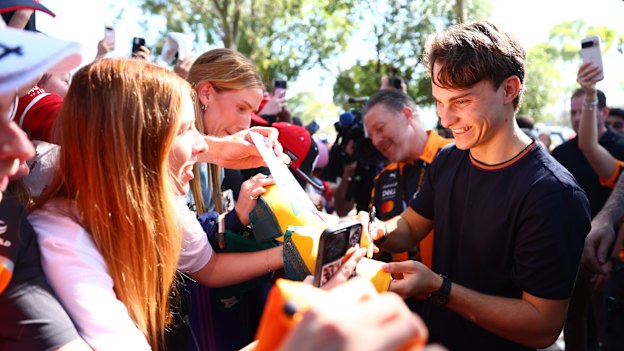 Oscar Piastri signs autographs in Melbourne this week. 