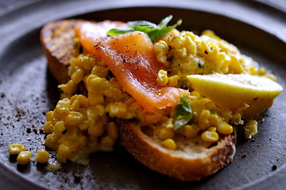 Creamed corn and smoked salmon on toast.