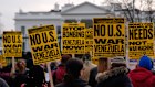 Protesters rally outside the White House after the US attack on Venezuela.