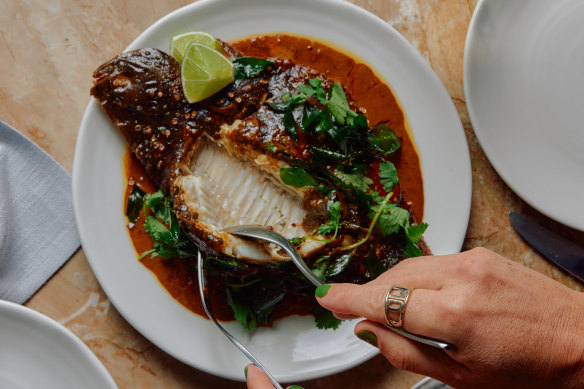 Wood-fired flounder, yellow curry, fried curry leaves at Prince Dining Room.