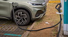 SINGAPORE, SINGAPORE - APRIL 07: A BYD Atto 3 electric vehicle charges at a Shell charging station on April 07, 2026 in Singapore. Singapore is strengthening its long-term energy resilience as the Iran conflict disrupts global supply routes, exposing vulnerabilities in import-dependent economies. The government has also formed a ministerial committee to address supply shocks and rising fuel and food prices. (Photo by Ezra Acayan/Getty Images)