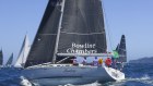 Bowline sails out of the heads following the start of the Sydney to Hobart yacht race.