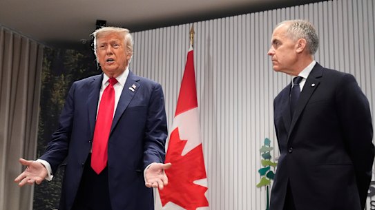 Trump took several questions from the media as Carney watched in silence.