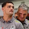 Nathan Cleary (left) and his dad Ivan Cleary at Brisbane airport on Saturday night. 