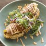 Roti John tiger roll filled with lamb shoulder and omelette.
