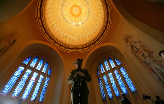A catafalque party guards the Tomb of the Unknown Australian Solider at the Australian War Memorial.