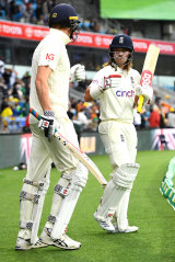 England openers Zak Crawley and Rory Burns walk out for their second innings during day three of the fifth Ashes Test in Hobart.