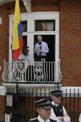 Assange makes a statement from the Ecuador embassy in 2012.