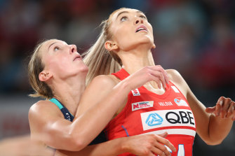 Helen Housby of the Swifts and Emily Mannix of the Vixens only have eyes for the ball on Saturday night.
