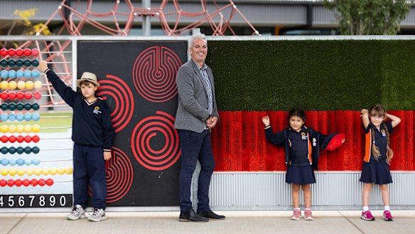 Armstrong Creek School already operates as inclusive education. The school caters to both students with and without a disability. Principal Evan Savage with Eli, 10, Andina, 5, and 6-year-old Arianna. 