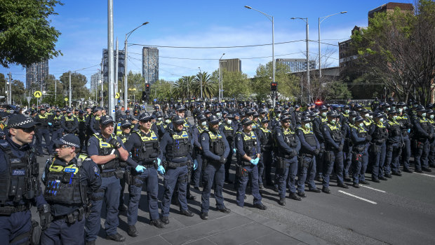 Dozens of police officers near Clarendon Street, Southbank on Thursday.