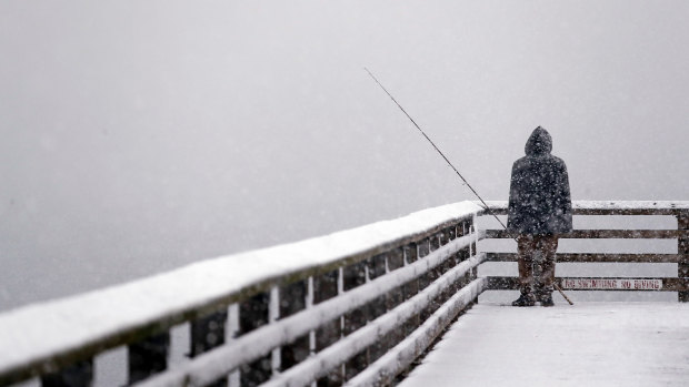 Seattle is lost in a whiteout during a snowstorm on Friday.
