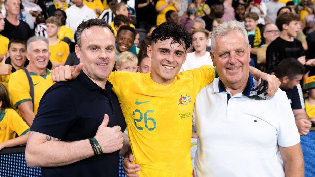 New Socceroo Alex Robertson with his father Mark (left) and grandfather Alex, who both also played for Australia.
