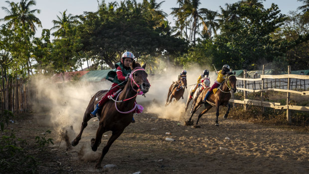 A horse race in Bima, on the Indonesian island of Sumbawa, where child jockeys are a longstanding tradition.