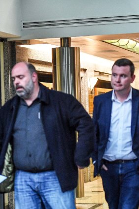Australian Workers Union boss Ben Davis (left) and state MP Tim Richardson leave an MP’s office recently after peace talks.