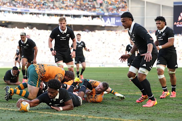 Peter Lakai stretches to score for the All Blacks.