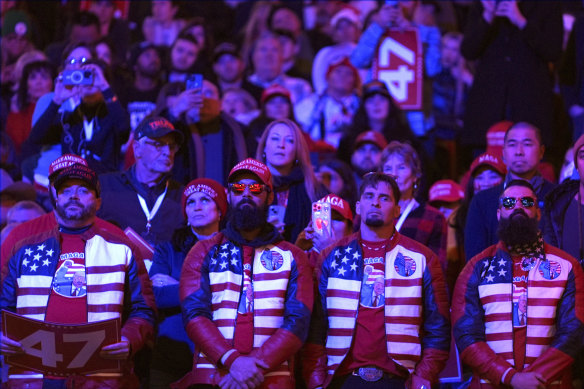 Supporters watch as Trump speaks at the Washington “victory rally”.