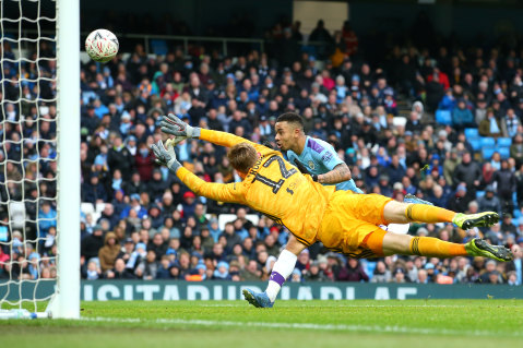 Gabriel Jesus scores Manchester City's fourth goal against Fulham at Etihad Stadium on Sunday.