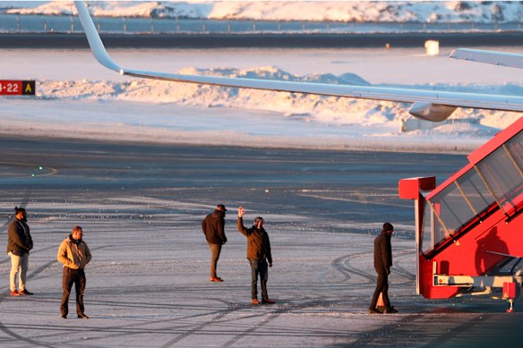 Donald Trump Jr, centre, at the airport in Nuuk, Greenland in January