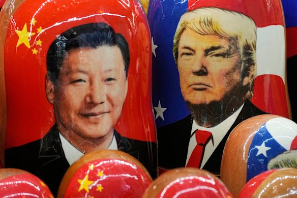 Xi and Trump depicted on Russian dolls. Critics fear the US leader is angling for a meeting with Xi.