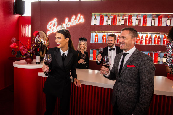 Former Geelong skipper Joel Selwood (right) samples the 2018 Grange at Penfolds.