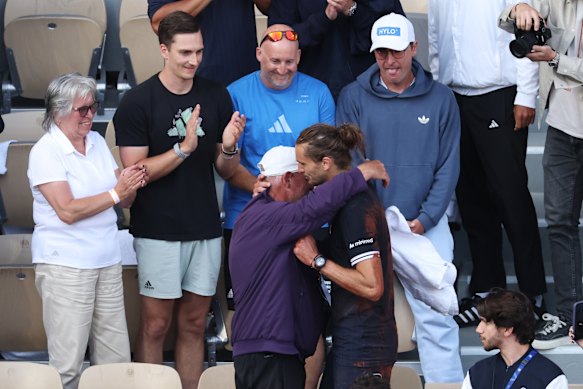 Zverev celebrates his Roland-Garros triumph with his father and coach.