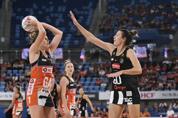 Magpie Fiona Fowler defends against the Giants’ Jo Harten.