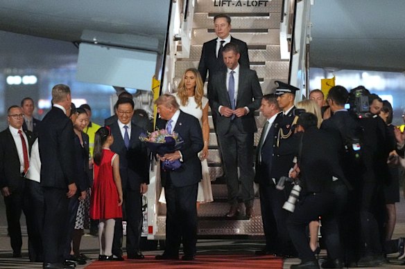President Donald Trump was greeted by Chinese Vice President Han Zheng as he arrived aboard Air Force One at Beijing Capital International Airport in Beijing. 