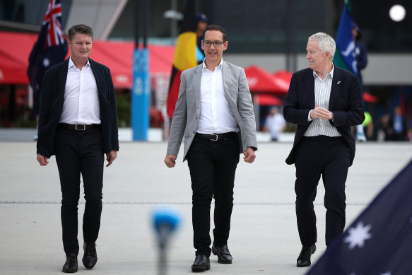 Tennis Australia chief Craig Tiley (right), pictured with acting Premier Ben Carroll (left) and Minister for Tourism, Sport and Major Events Steve Dimopoulos on Sunday. 