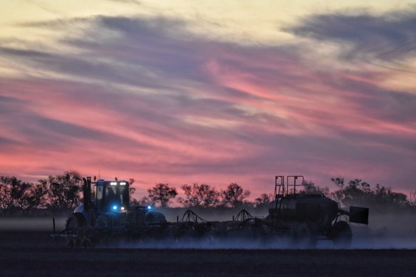 A farmer tills a field near Walgett in north-western NSW in mid-May 2020.