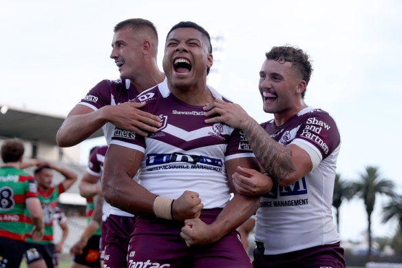 Raymond Tuaimalo Vaega celebrates a try.