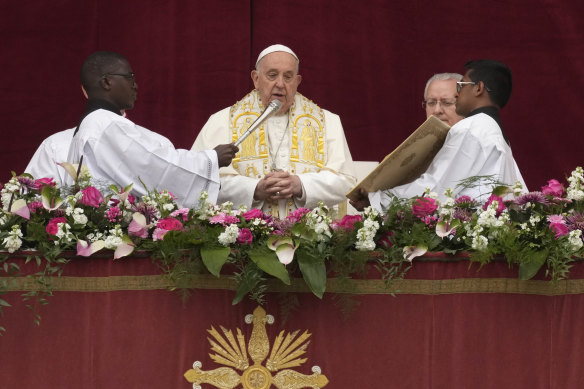 Pope Francis bestows the “Urbi et Orbi” (To the city and to the world) blessing from the central lodge of the St Peter’s Basilica at the Vatican on Sunday.