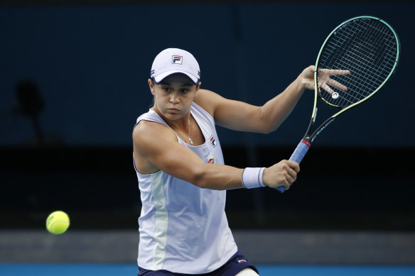 Ashleigh Barty plays a backhand in her fourth-round match against American Shelby Rogers on Monday night.