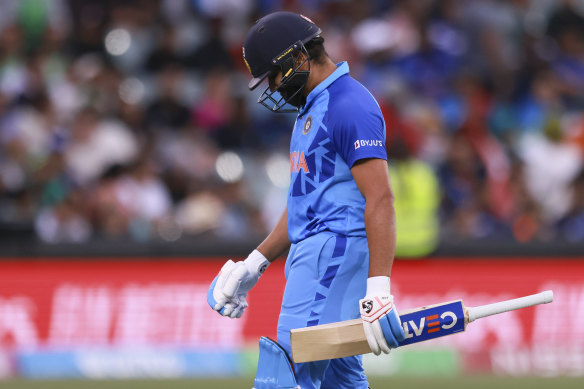 Rohit Sharma walks off.
