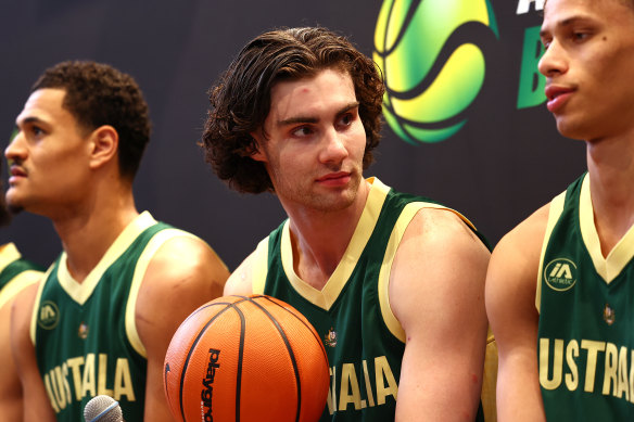 Australian Boomers player Josh Giddey (middle) attends an in-store appearance at Foot Locker QV on Friday with Josh Green (left) and Dyson Daniels (right).